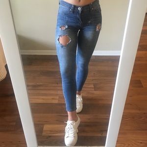 Distressed mid rise jeans
